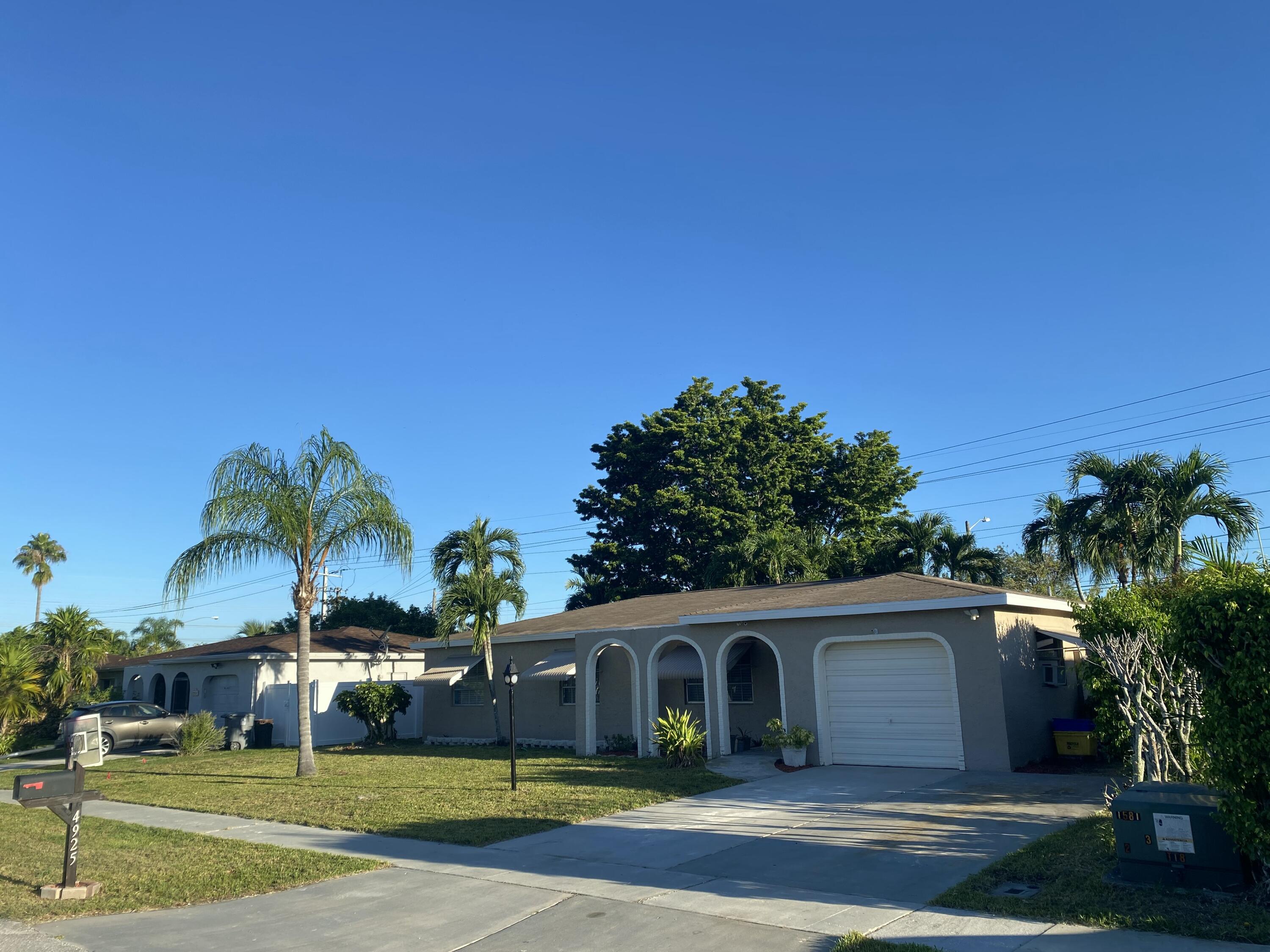 4925 Ataman Street Boca Raton, FL 33428 - Photo 2 of 21 IMG_4705