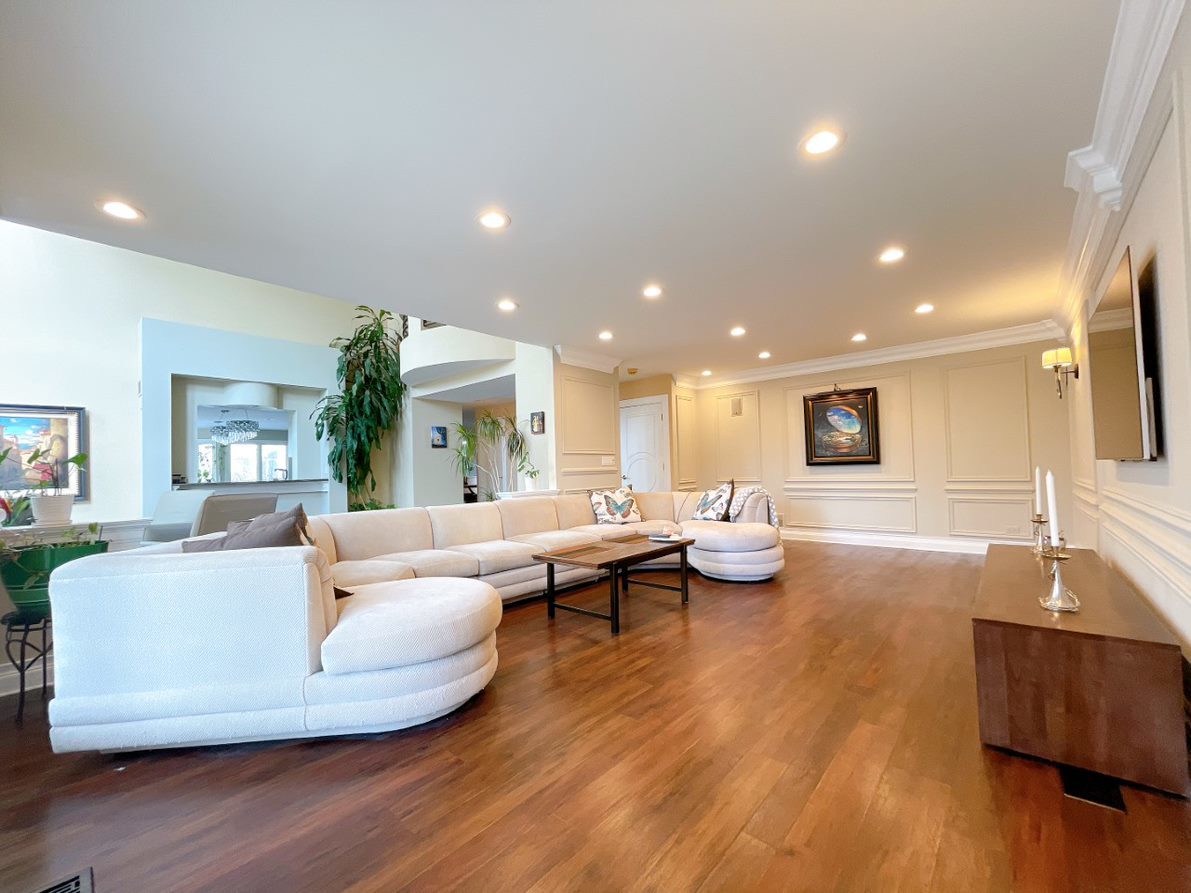 2047 Sheridan Road Buffalo Grove, IL 60089 - Photo 12 of 25 a living room with furniture and a wooden floor