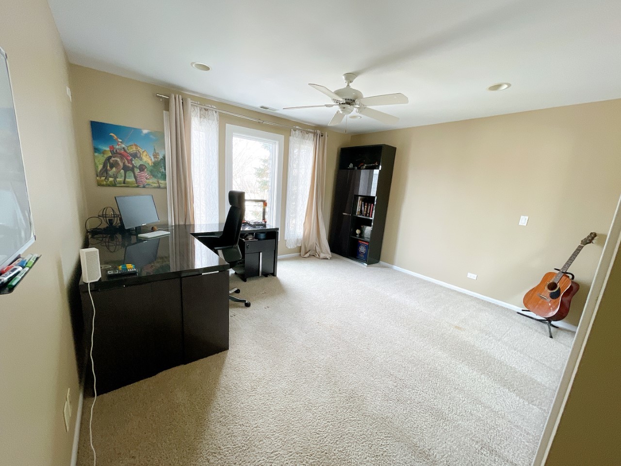 2047 Sheridan Road Buffalo Grove, IL 60089 - Photo 18 of 25 a living room with furniture and a gym machine