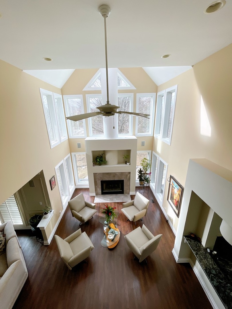 2047 Sheridan Road Buffalo Grove, IL 60089 - Photo 20 of 25 a living room with furniture fireplace and flat screen tv