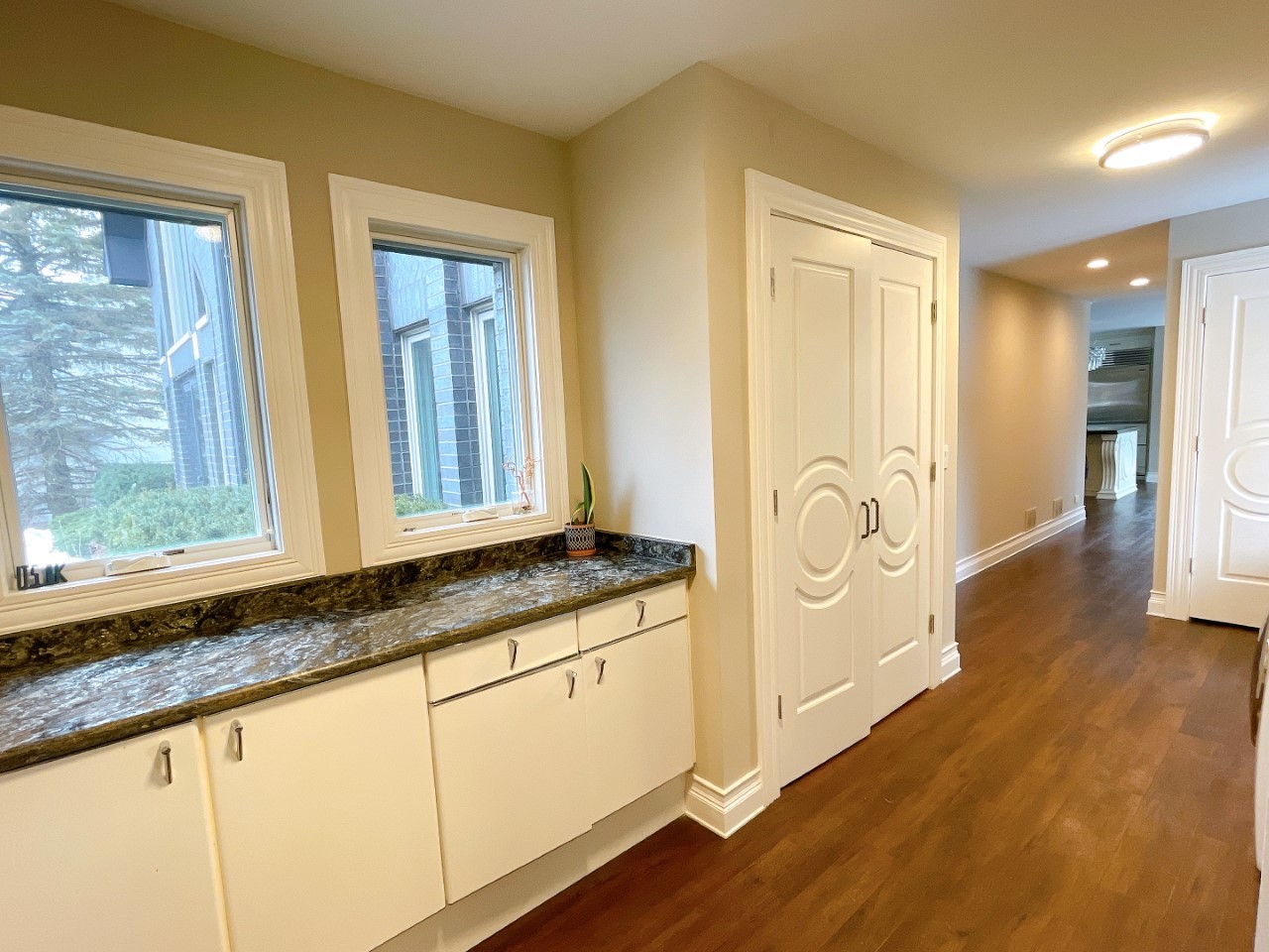 2047 Sheridan Road Buffalo Grove, IL 60089 - Photo 21 of 25 a view of a granite countertop cabinets and a wooden floor