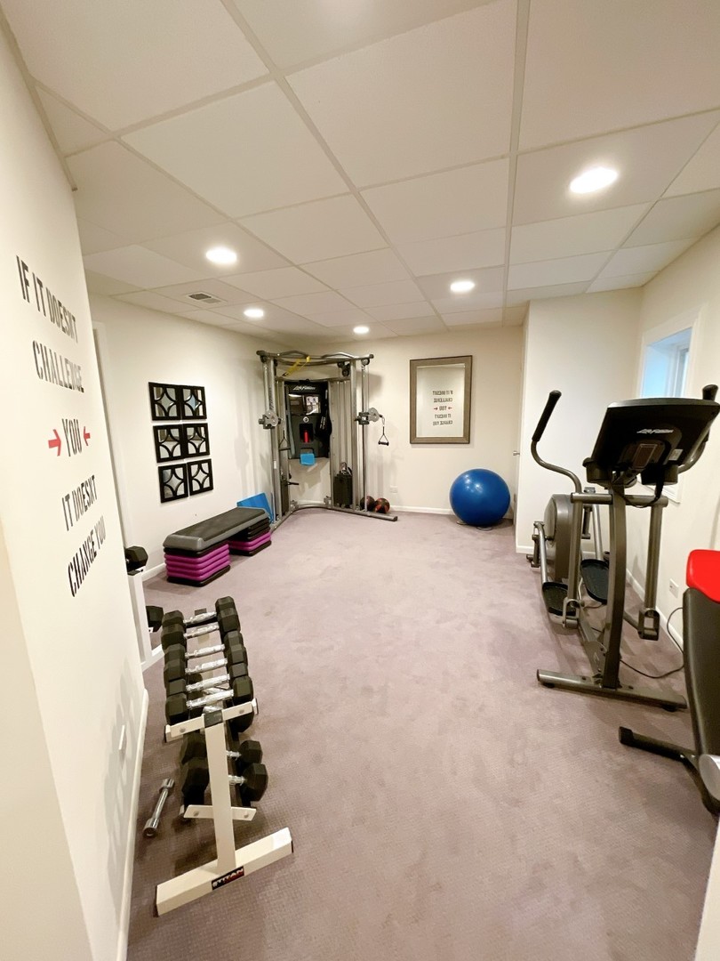 2047 Sheridan Road Buffalo Grove, IL 60089 - Photo 24 of 25 a room with gym equipment and a large window