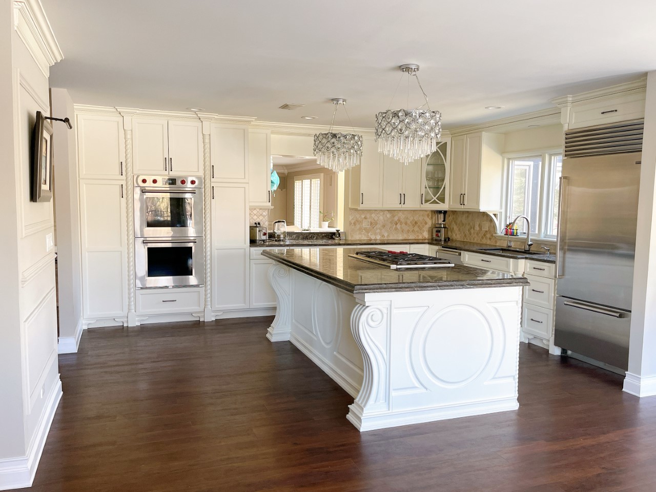 2047 Sheridan Road Buffalo Grove, IL 60089 - Photo 4 of 25 a kitchen with kitchen island granite countertop a stove a sink and a refrigerator