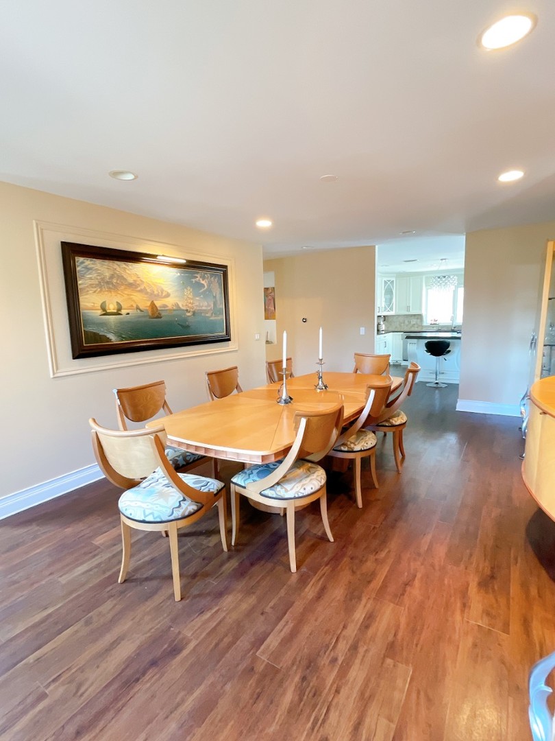 2047 Sheridan Road Buffalo Grove, IL 60089 - Photo 8 of 25 a living room with dining room and wooden floor