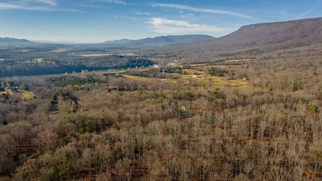 a view of a lake with mountains in the background