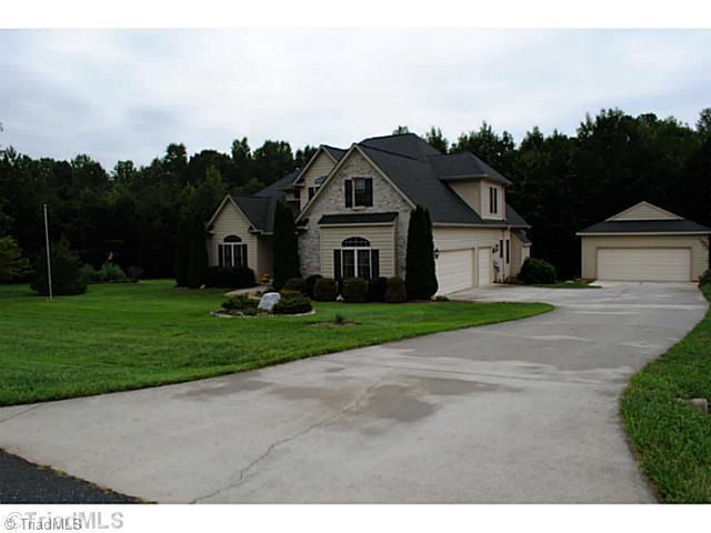 7513 Adler Road Summerfield, NC 27358 - Photo 2 of 16 Exterior Front.
