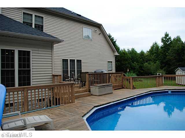 7513 Adler Road Summerfield, NC 27358 - Photo 15 of 16 Exterior Front.