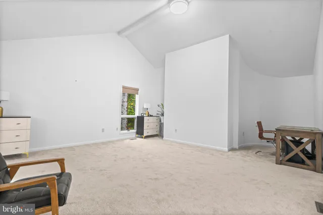 a view of a balcony with wooden floor