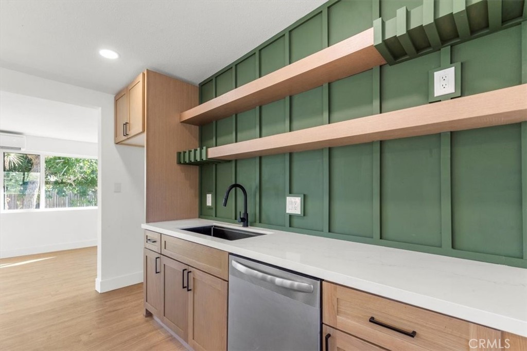 6431 Goleta Avenue Yucca Valley, CA 92284 - Photo 4 of 23 a kitchen with a cabinets and windows