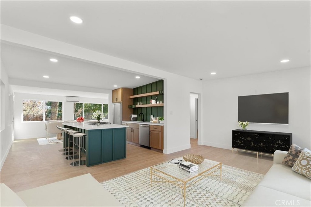 6431 Goleta Avenue Yucca Valley, CA 92284 - Photo 5 of 23 a living room with furniture and a flat screen tv