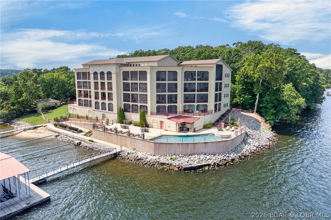 3168 Twin Rivers Point, Unit 2B Camdenton, MO 65020 - Photo 58 of 92 Such a Majestic Lakefront Structure! It is not you