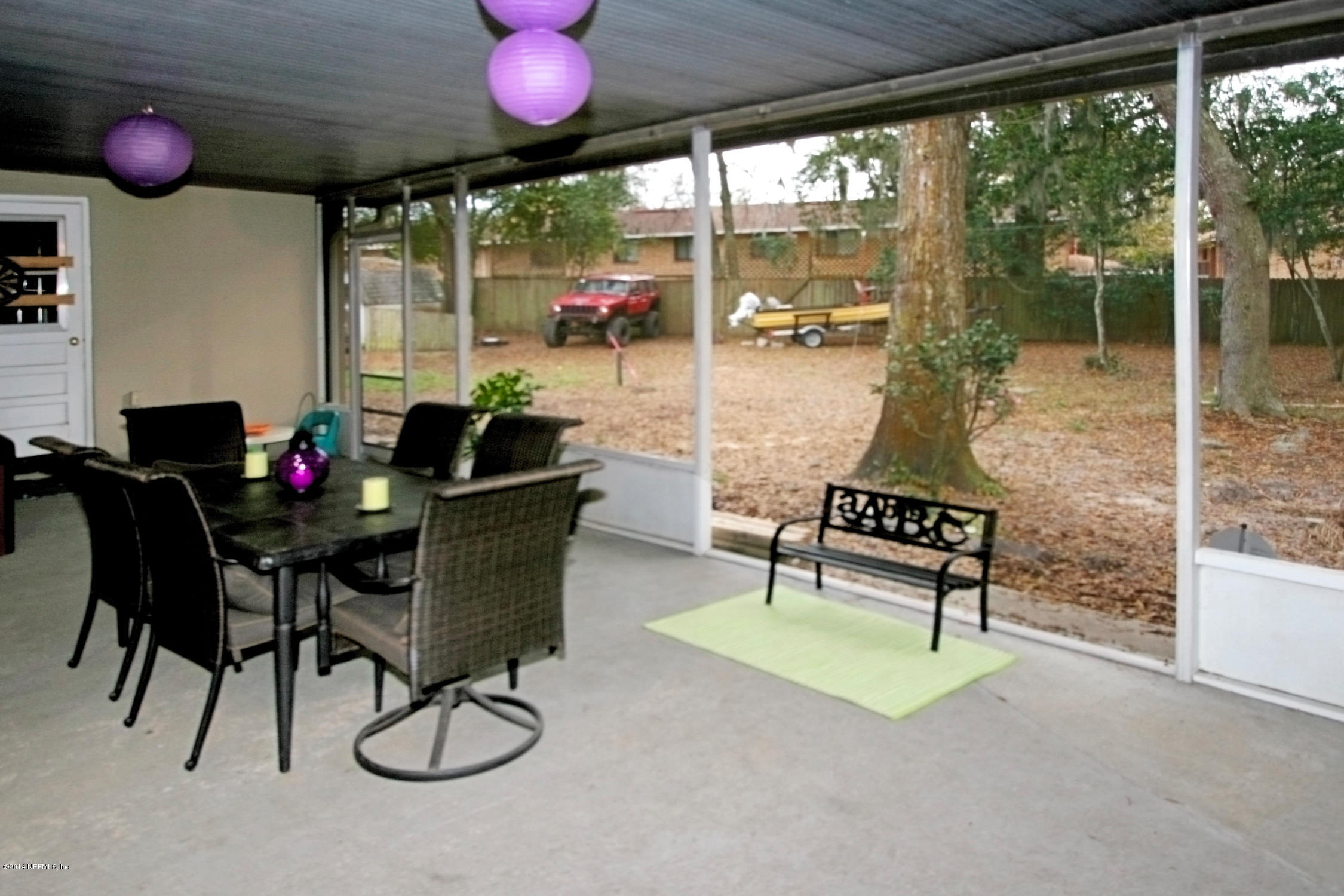 6404 Heidi Road Jacksonville, FL 32277 - Photo 22 of 26 a view of a livingroom with furniture and window