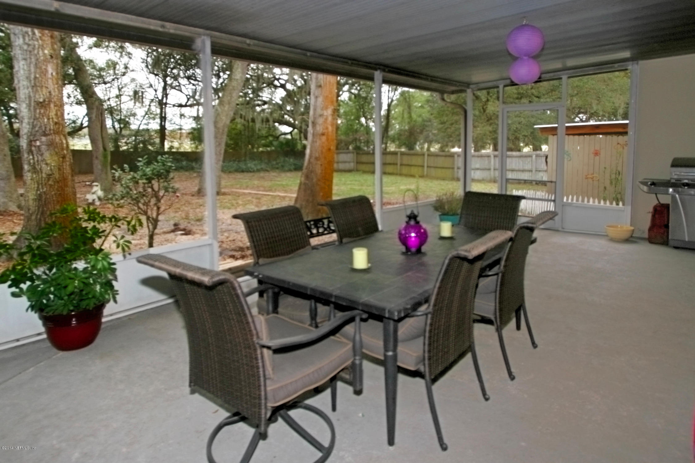 6404 Heidi Road Jacksonville, FL 32277 - Photo 23 of 26 a view of a dining room with furniture window and outside view