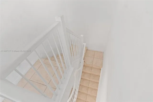 a view of entryway with stairs