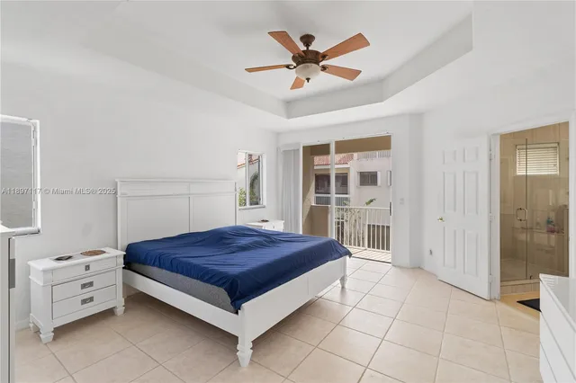 a bedroom with a bed and a cabinets