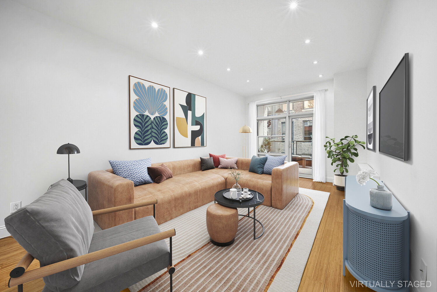 159 Madison Avenue, Unit 9B Manhattan, NY 10016 - Photo 1 of 16 a living room with furniture and a large window