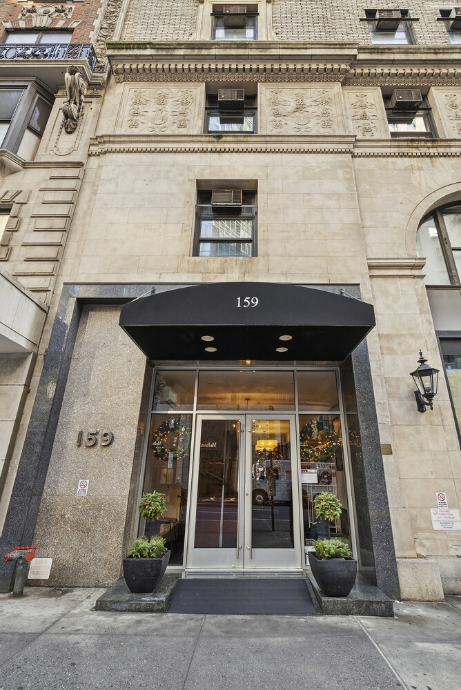 159 Madison Avenue, Unit 9B Manhattan, NY 10016 - Photo 14 of 16 a front view of a building with entryway