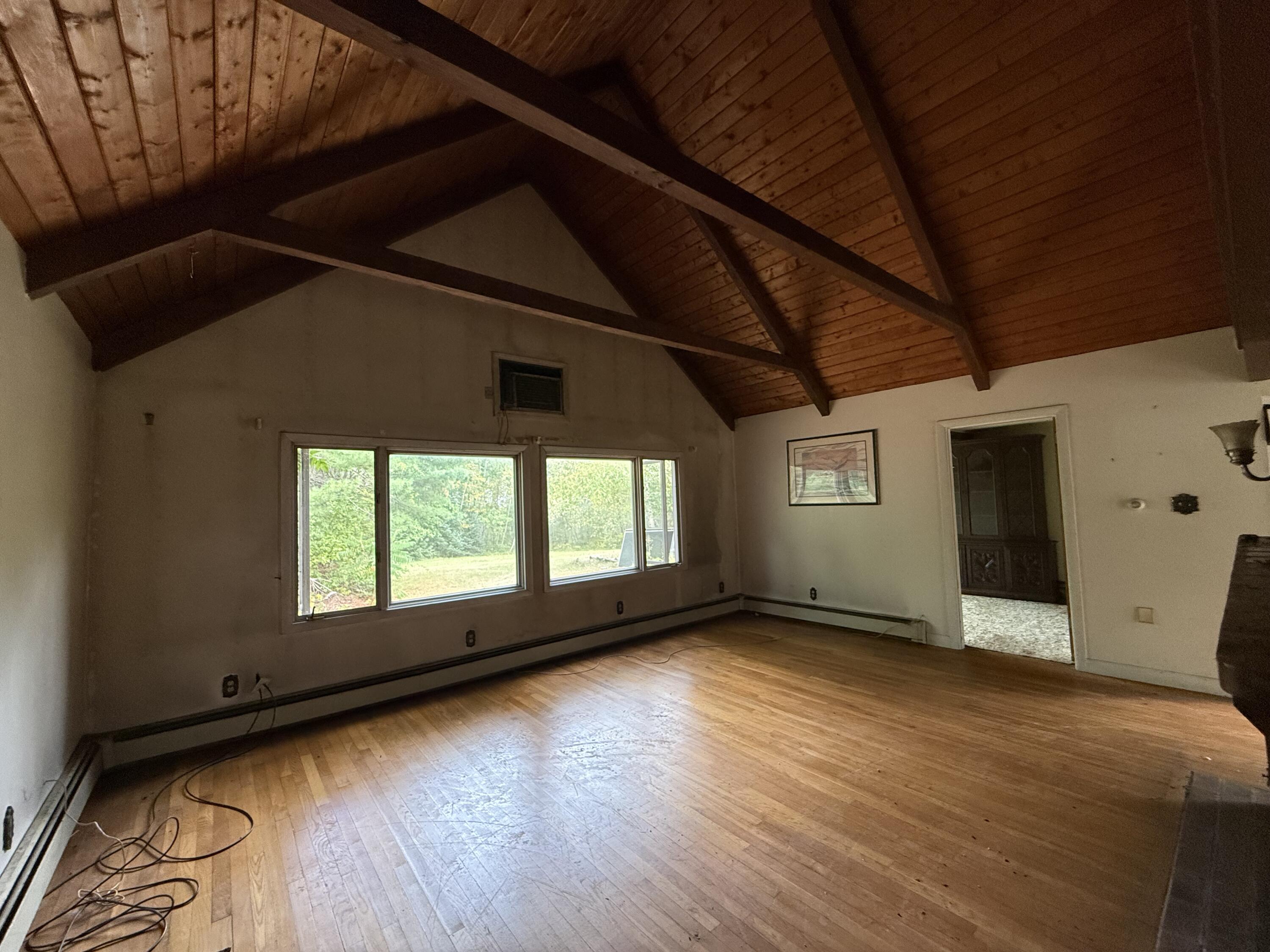 339 Mountain Road Woolwich, ME 04579 - Photo 14 of 30 Living Room with office entrance