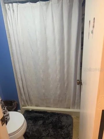 a bathroom with a sink and toilet