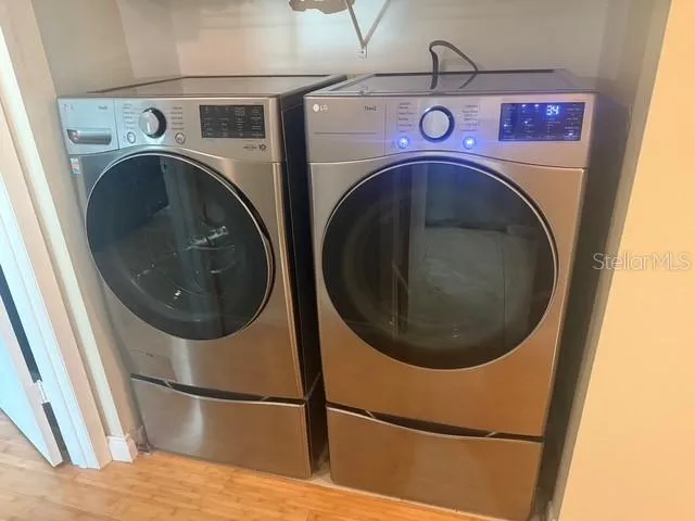 a utility room with dryer and washer