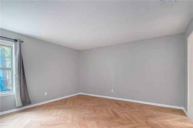 an empty room with windows