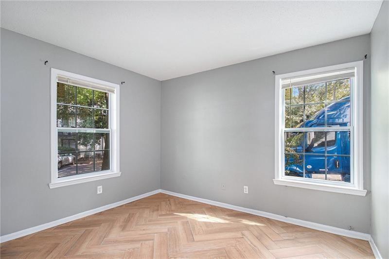 3599 Woodbriar Circle, Unit A Tucker, GA 30084 - Photo 21 of 30 a view of an empty room with a window