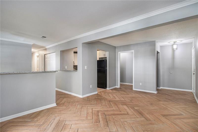 3599 Woodbriar Circle, Unit A Tucker, GA 30084 - Photo 6 of 30 a view of a big room with closet and windows