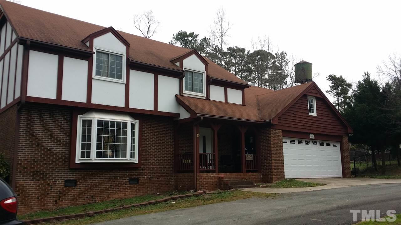 5404 Live Oak Trail Raleigh, NC 27613 - Photo 1 of 14 a front view of a house