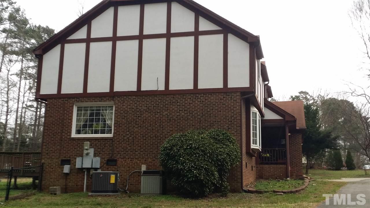 5404 Live Oak Trail Raleigh, NC 27613 - Photo 3 of 14 a front view of a house with garden