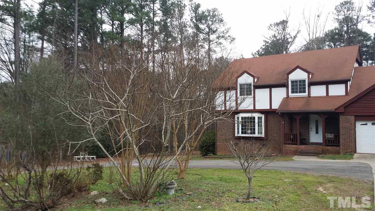 5404 Live Oak Trail Raleigh, NC 27613 - Photo 6 of 14 a front view of a house with garden