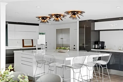 a view of kitchen and dining area with furniture