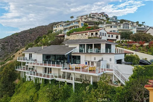 a view of a large building with a garden