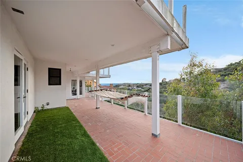 a view of a terrace with a garden