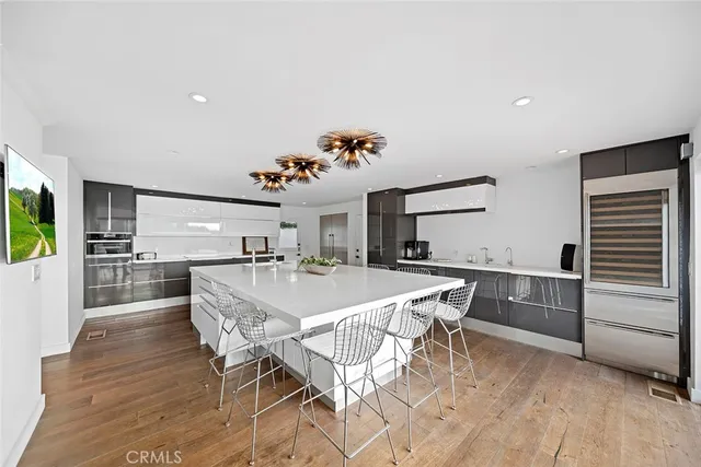 a kitchen with a table and chairs in it