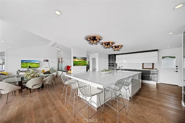 a very nice looking dining room with a table and chairs