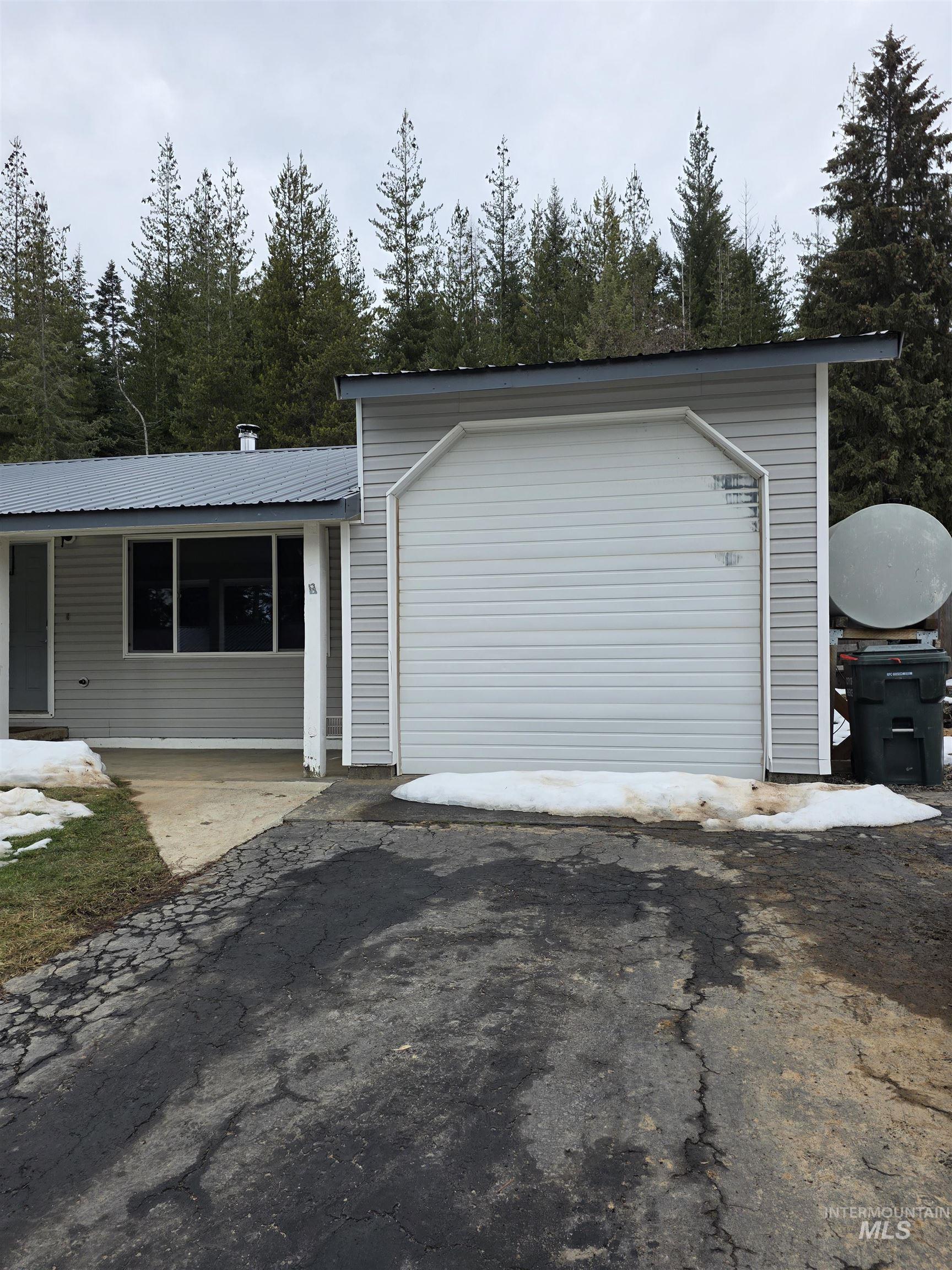 179 Timberline Drive Pierce, ID 83546 - Photo 3 of 24 View of side of property featuring a porch