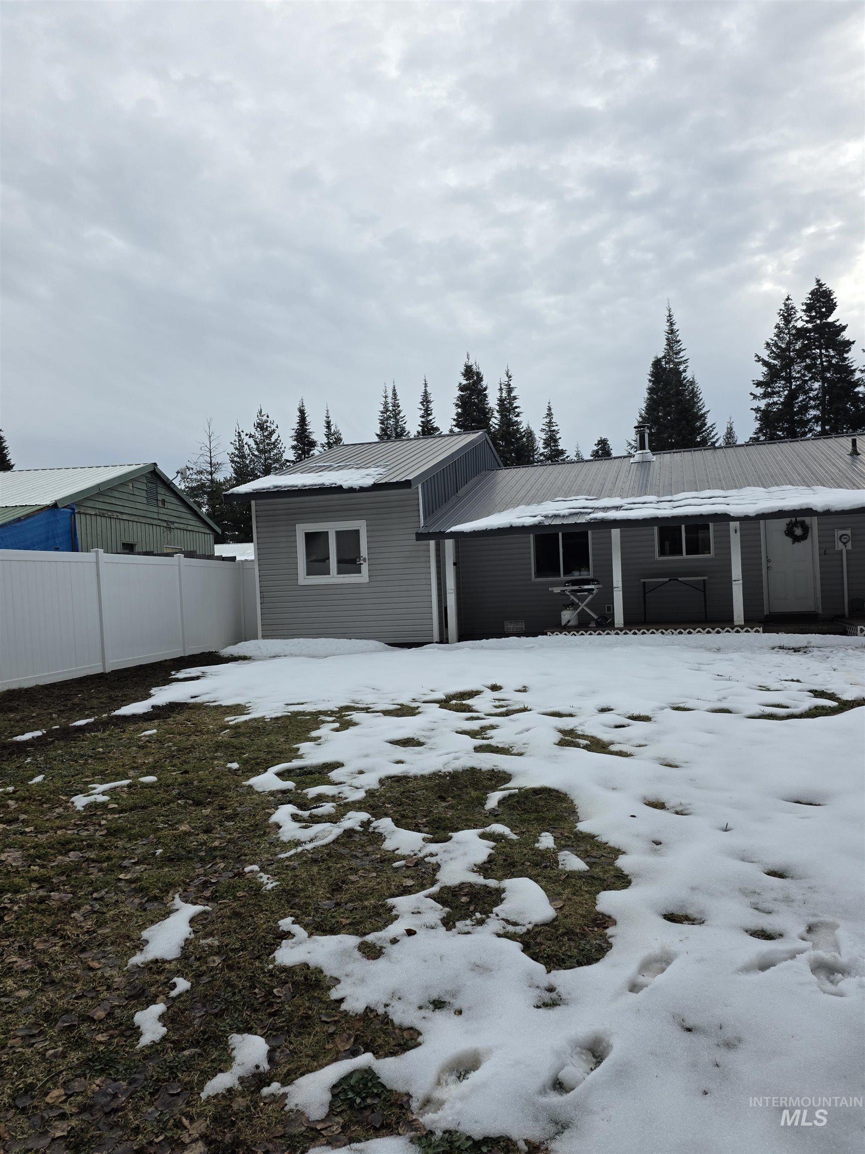 179 Timberline Drive Pierce, ID 83546 - Photo 5 of 24 View of snow covered back of property