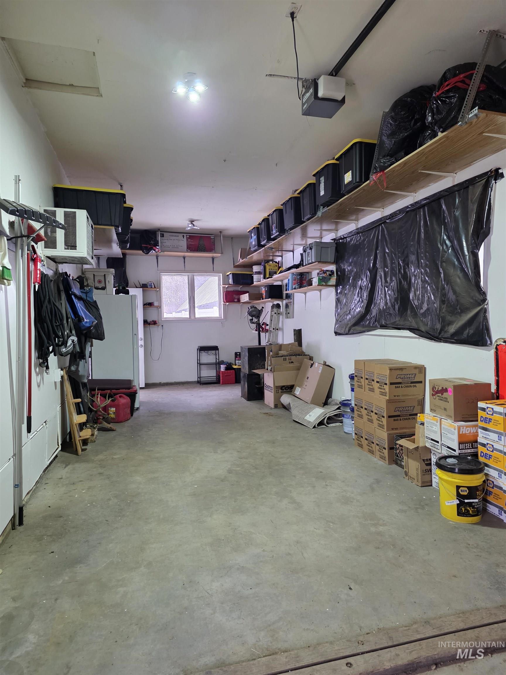 179 Timberline Drive Pierce, ID 83546 - Photo 8 of 24 Garage with a garage door opener