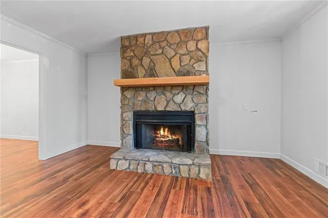 a living room with a fireplace