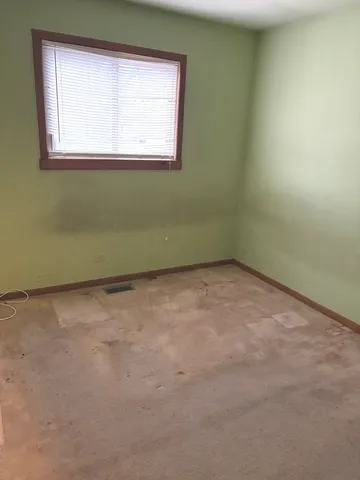 an empty room with a window