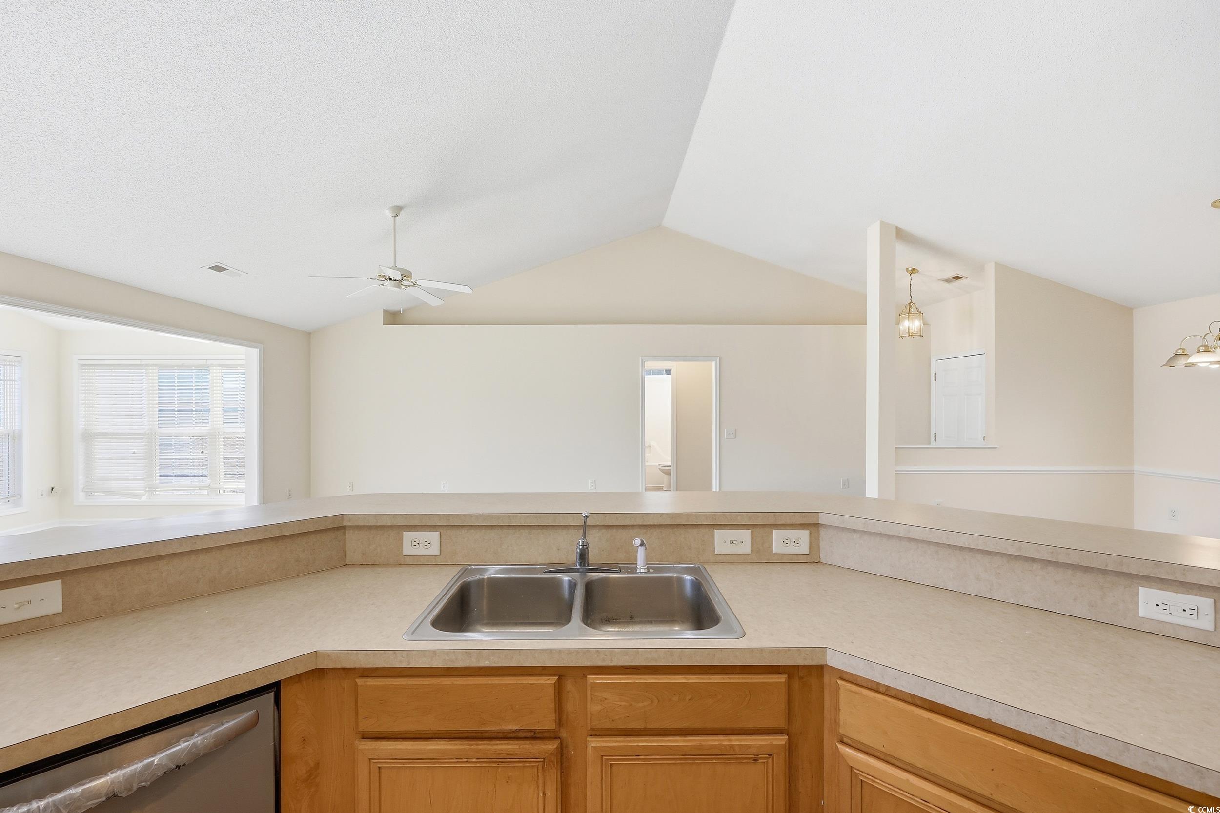 323 Chastain Court Murrells Inlet, SC 29576 - Photo 14 of 37 Kitchen with appliances with stainless steel finishes and light countertops