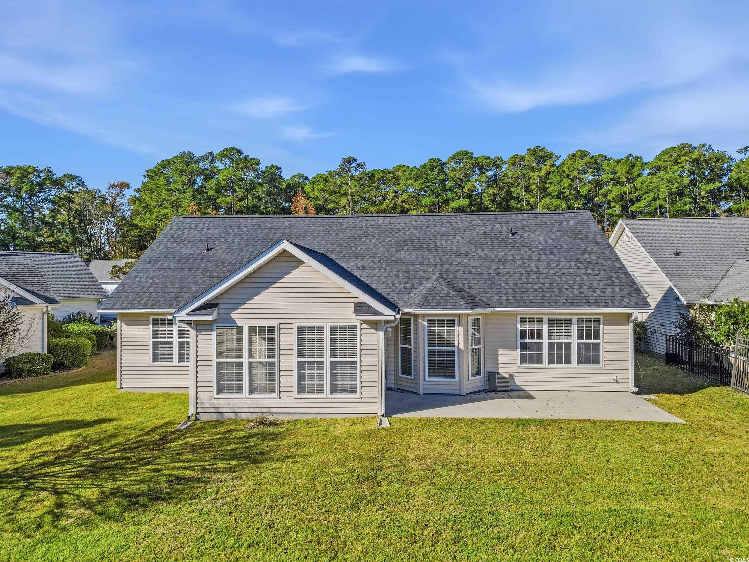 323 Chastain Court Murrells Inlet, SC 29576 - Photo 32 of 37 Garage with electric panel and a garage door opener