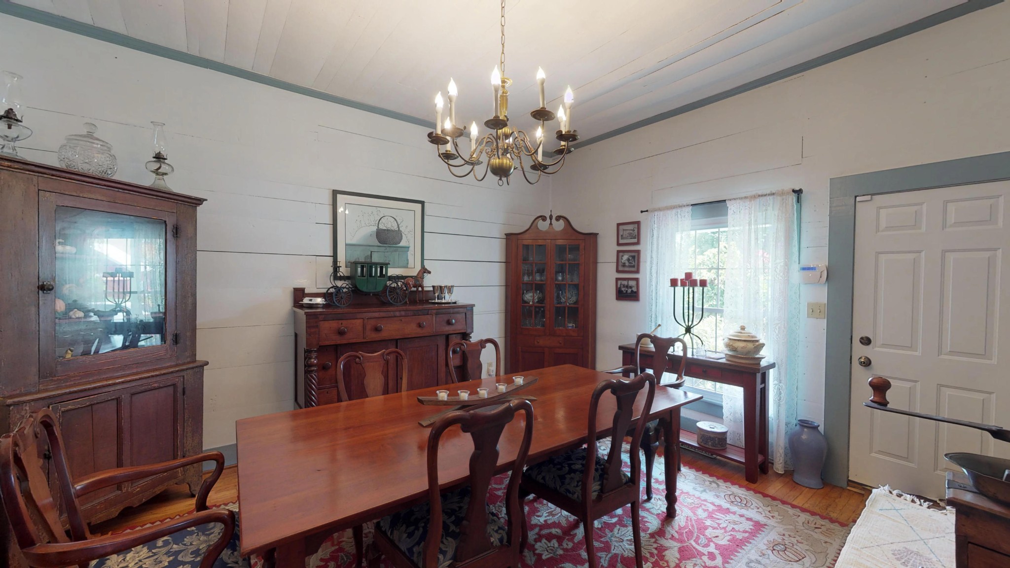 4965 Roberson Spring Road Loudon, TN 37774 - Photo 15 of 39 a view of a dining room with furniture and chandelier