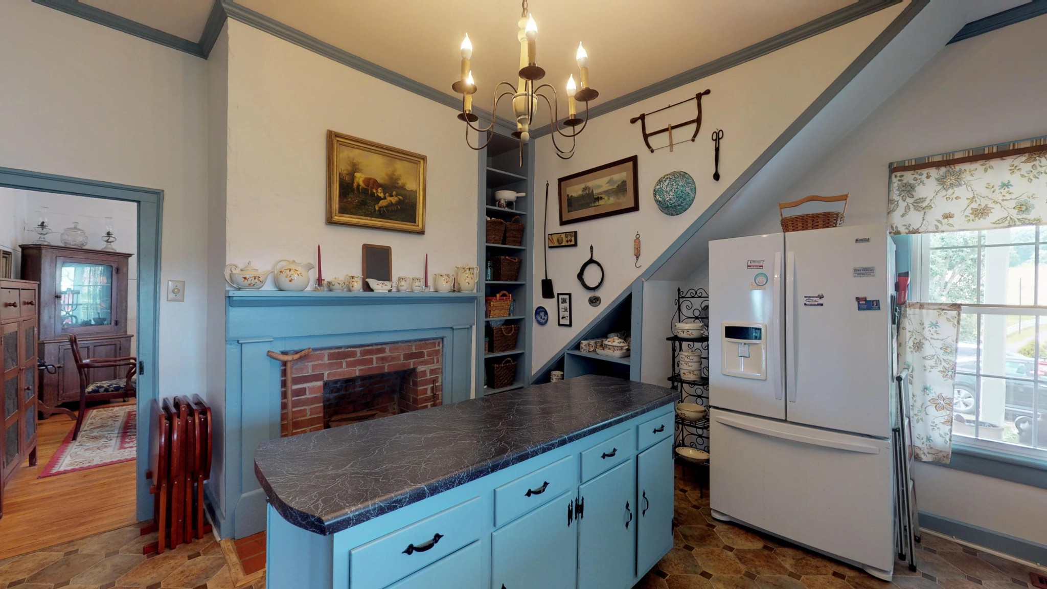 4965 Roberson Spring Road Loudon, TN 37774 - Photo 17 of 39 a kitchen with furniture and a fireplace