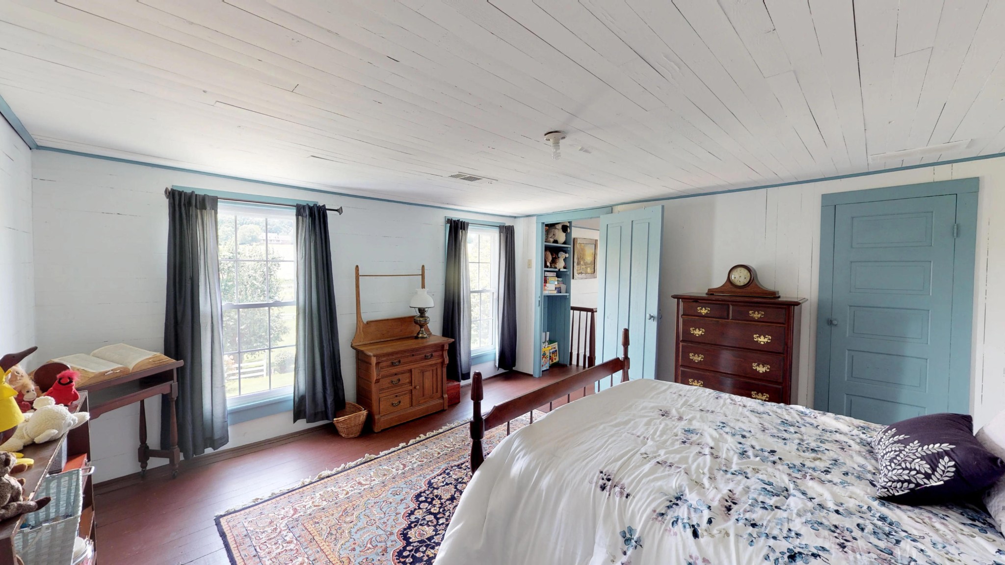 4965 Roberson Spring Road Loudon, TN 37774 - Photo 24 of 39 a bedroom with a bed and a closet