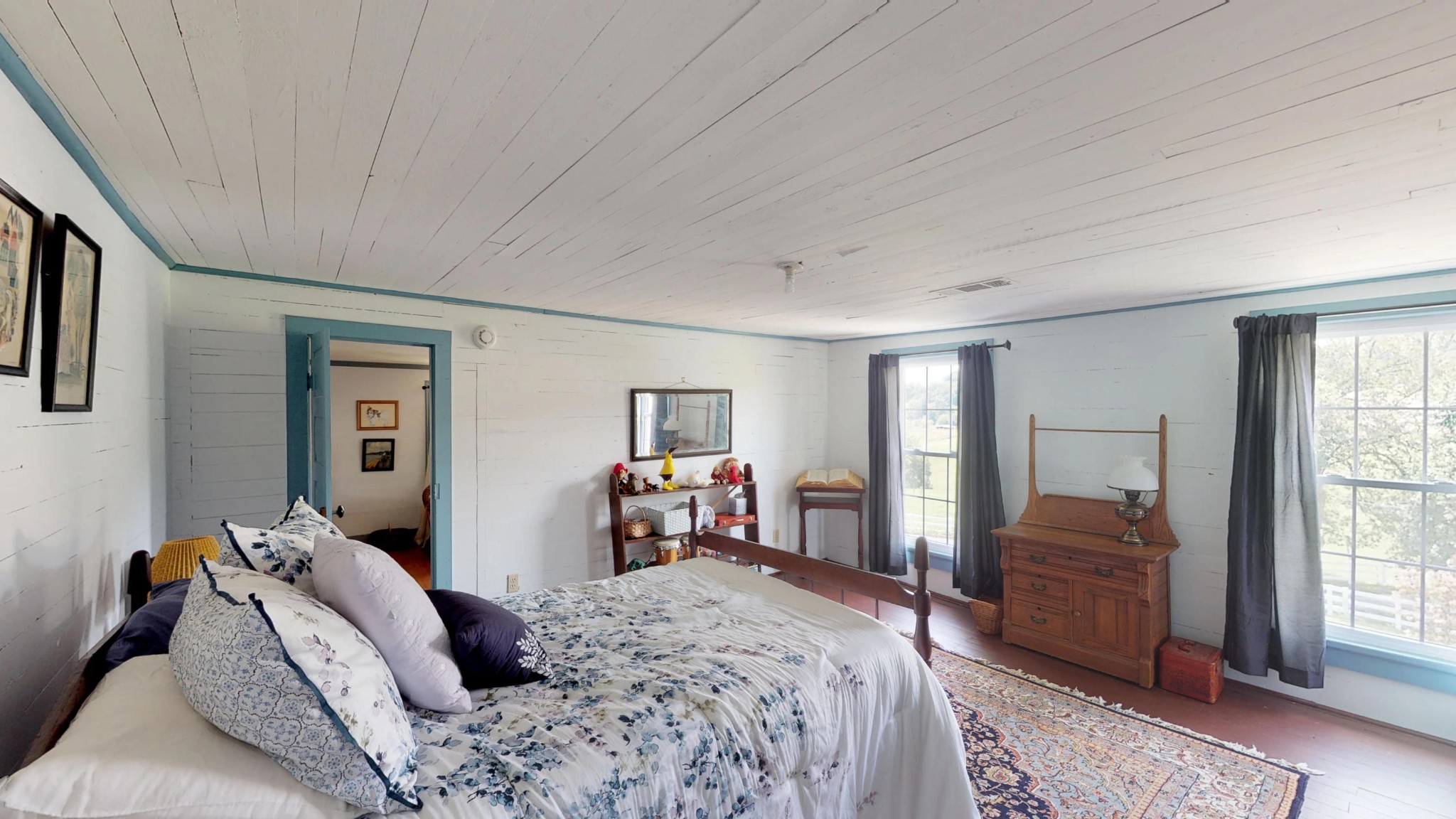 4965 Roberson Spring Road Loudon, TN 37774 - Photo 25 of 39 a bedroom with a bed and wooden floor