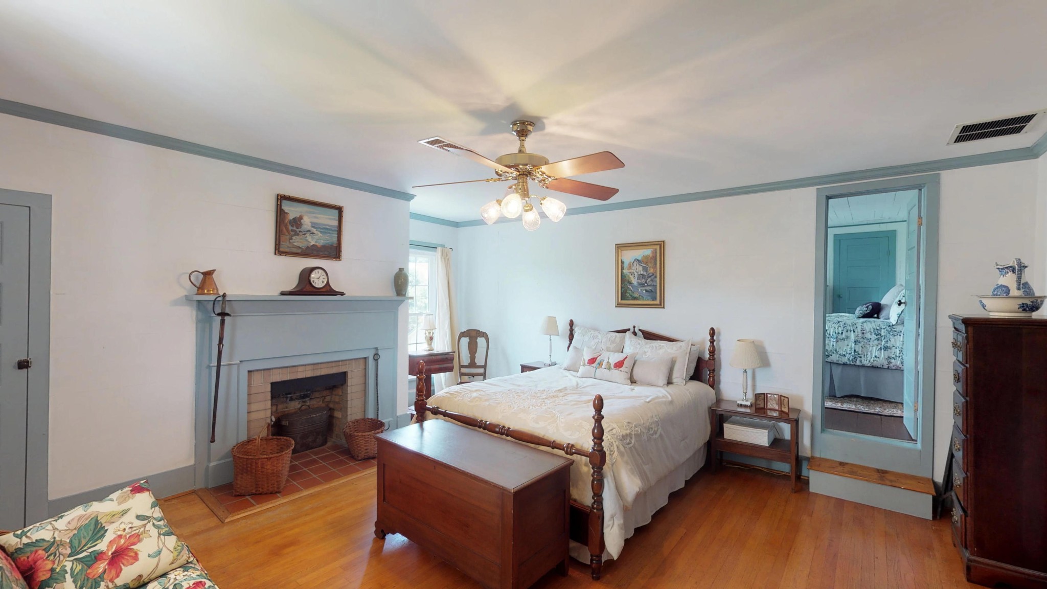 4965 Roberson Spring Road Loudon, TN 37774 - Photo 27 of 39 a spacious bedroom with a bed and a fireplace