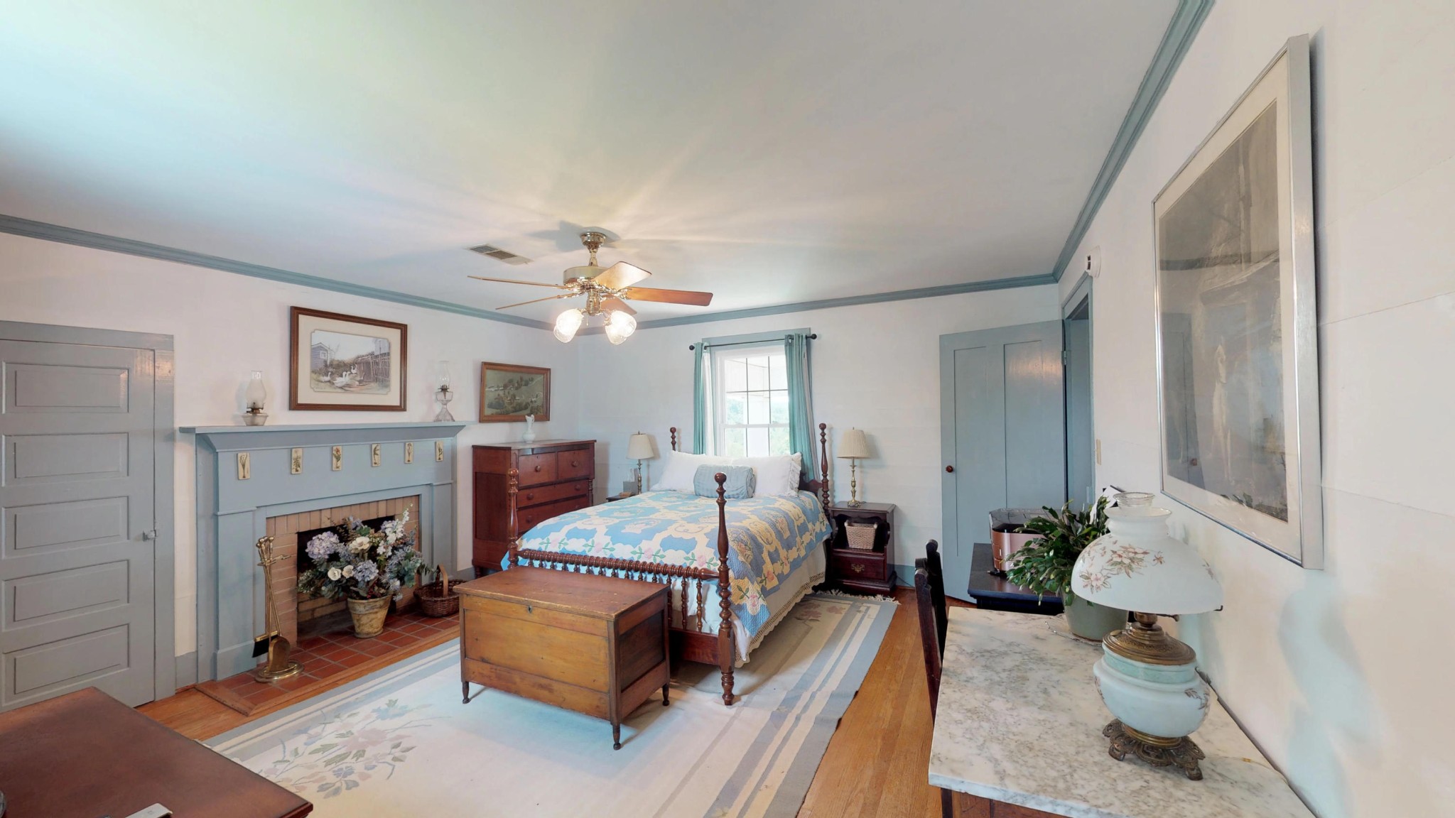 4965 Roberson Spring Road Loudon, TN 37774 - Photo 29 of 39 a living room with furniture a fireplace and a chandelier