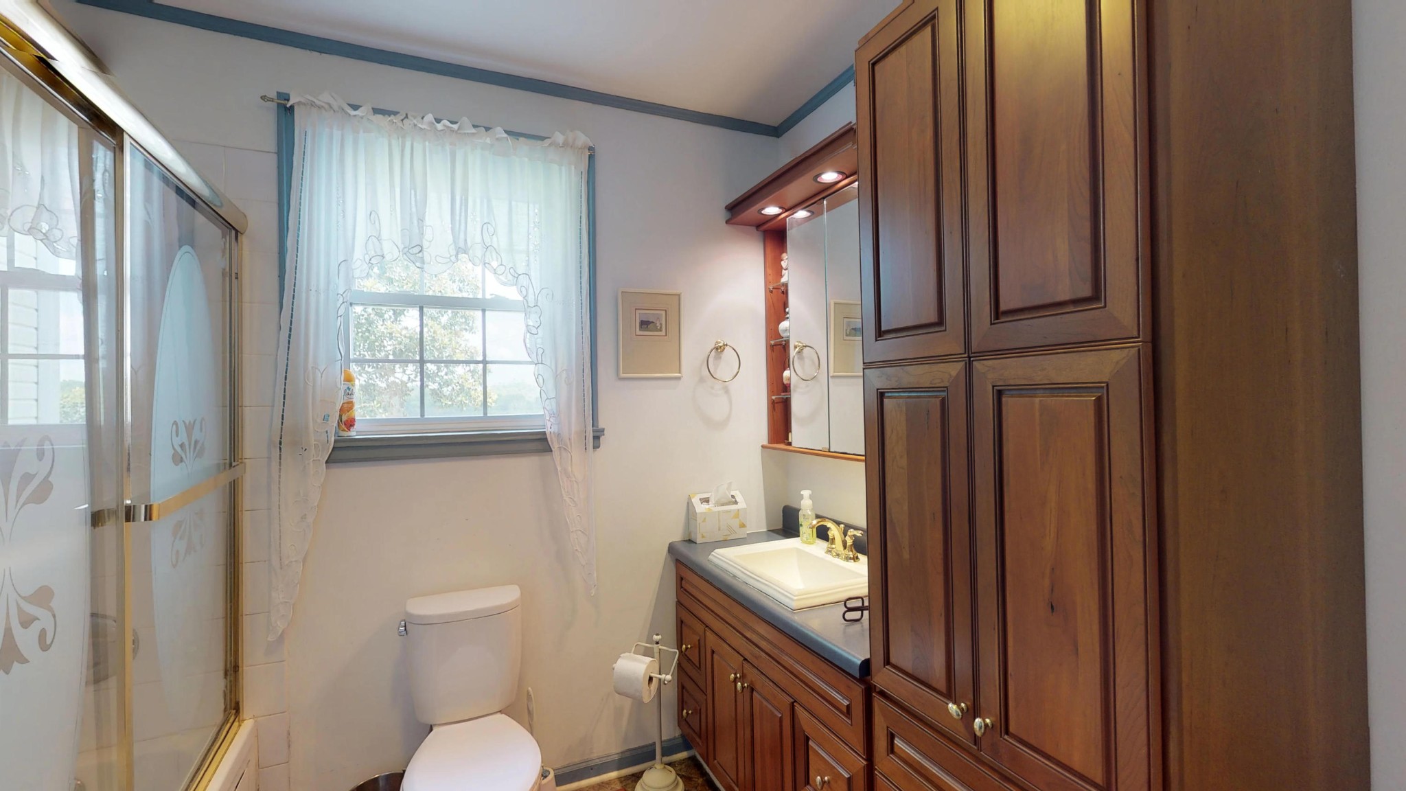 4965 Roberson Spring Road Loudon, TN 37774 - Photo 34 of 39 a bathroom with a granite countertop sink toilet and shower
