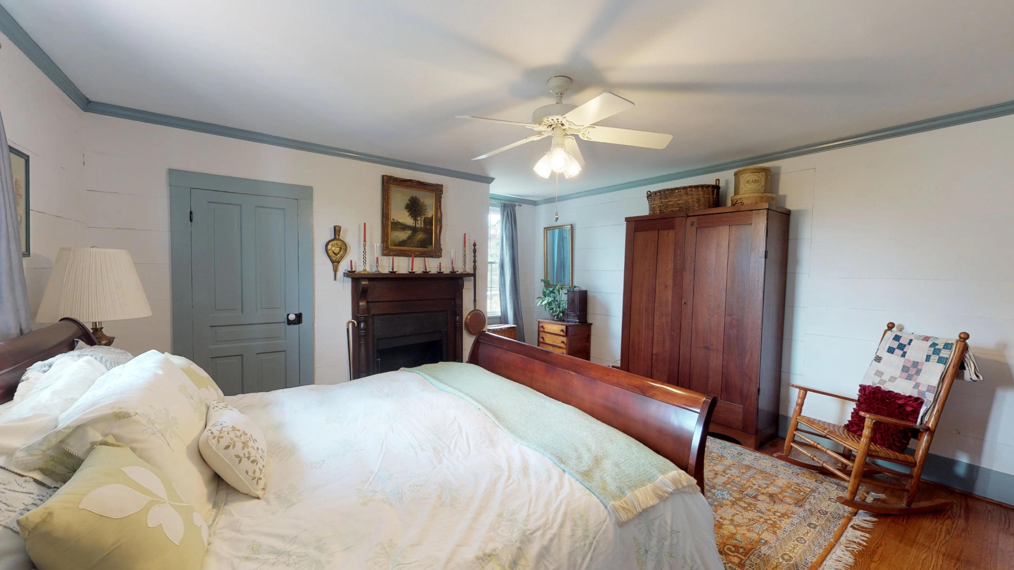 4965 Roberson Spring Road Loudon, TN 37774 - Photo 37 of 39 a bedroom with a bed and a chandelier